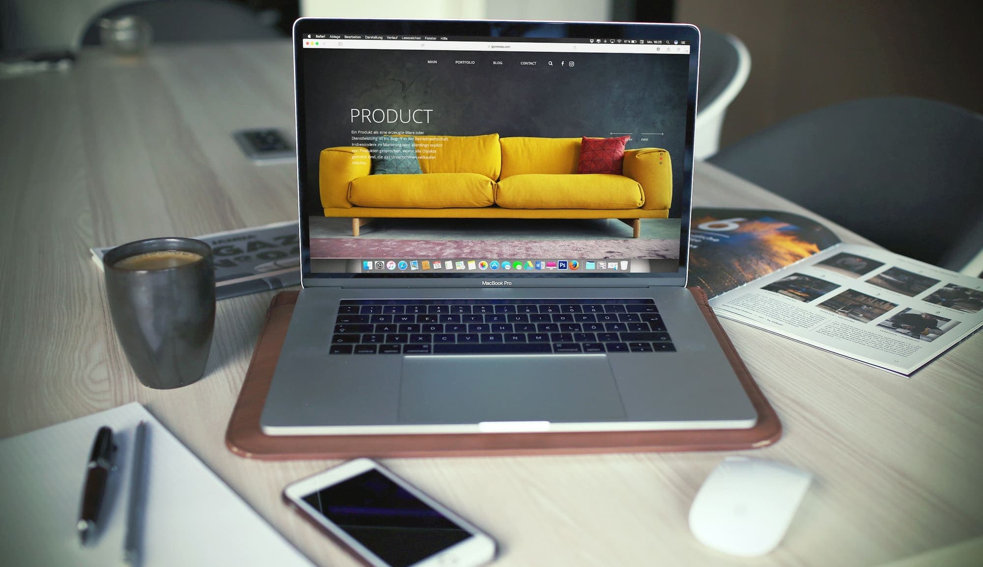 Laptop showing an online store website on a desk